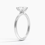 Fleur Solitaire Ring Platinum Pear Engagement Ring