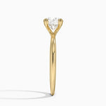 Freesia Triple-Prong Solitaire Ring Yellow Gold 18k Round Engagement Ring