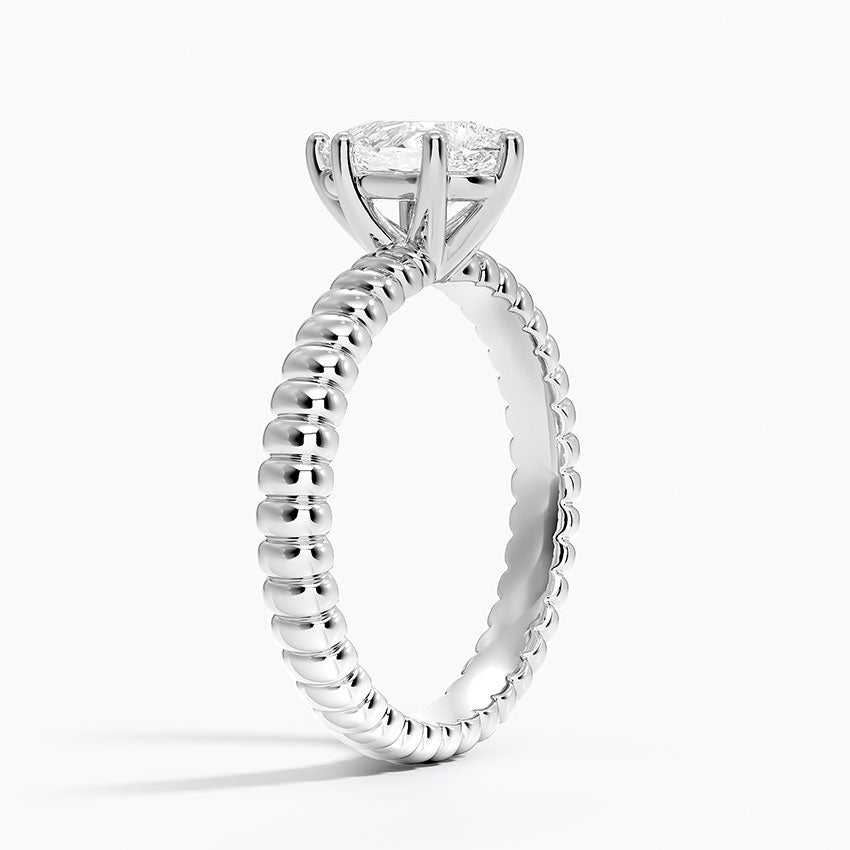Petra Textured Solitaire Ring Platinum Pear Engagement Ring